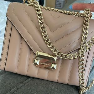 Michael Kors light pink leather crossbody bag with gold chain strap